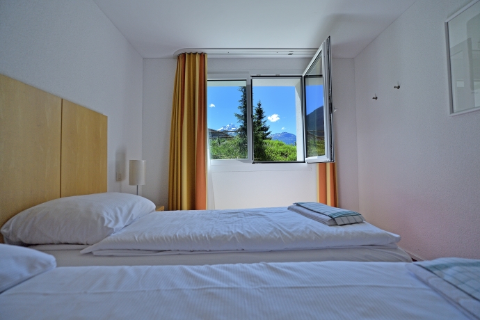 Zimmer im Ferienresort Surses Alpin, Savognin